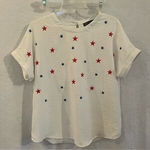 Volume One White Top with Red and Blue Stars